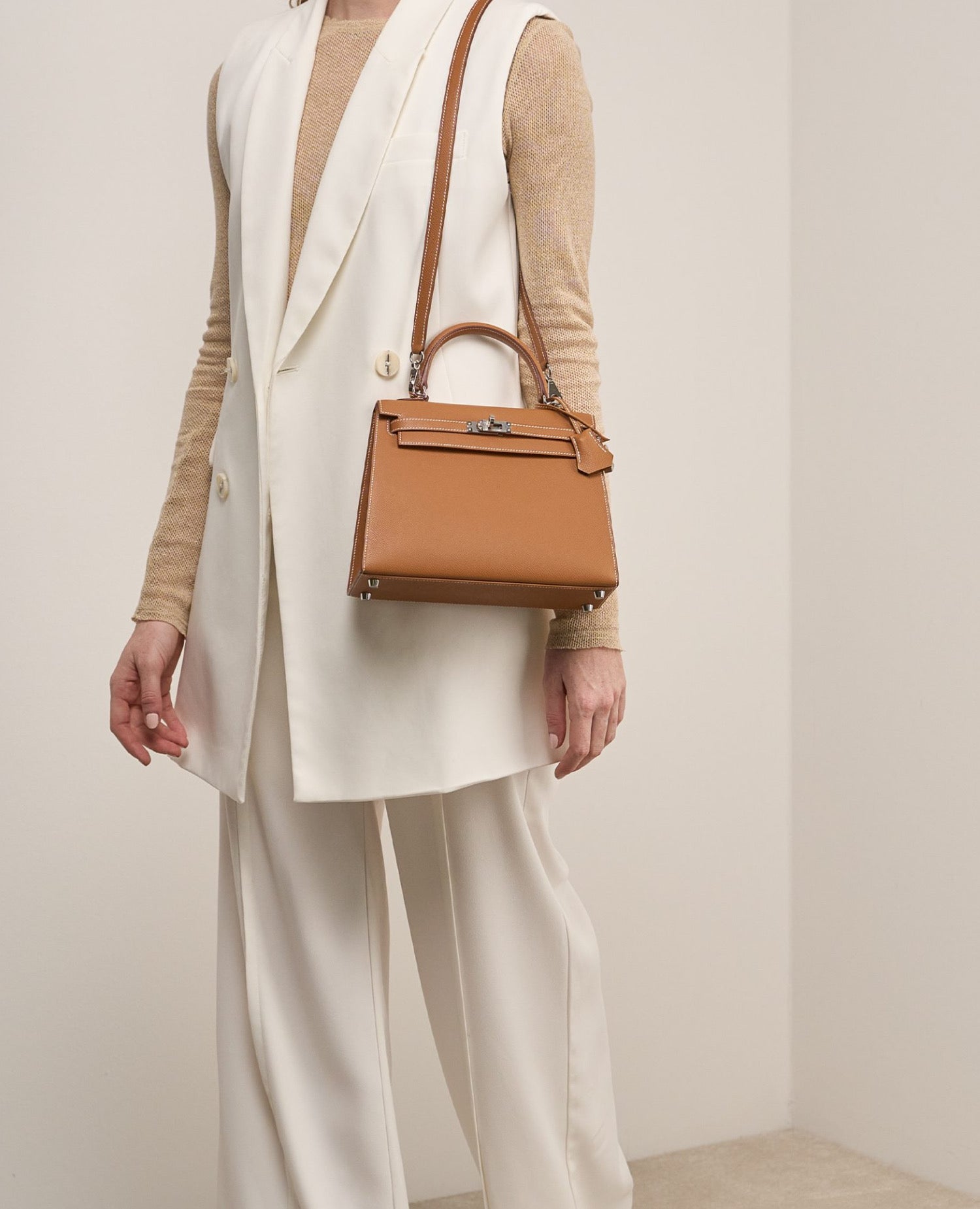 حقيبة هيرمس كيلي 25 إبسوم ذهبية إطارات فضية